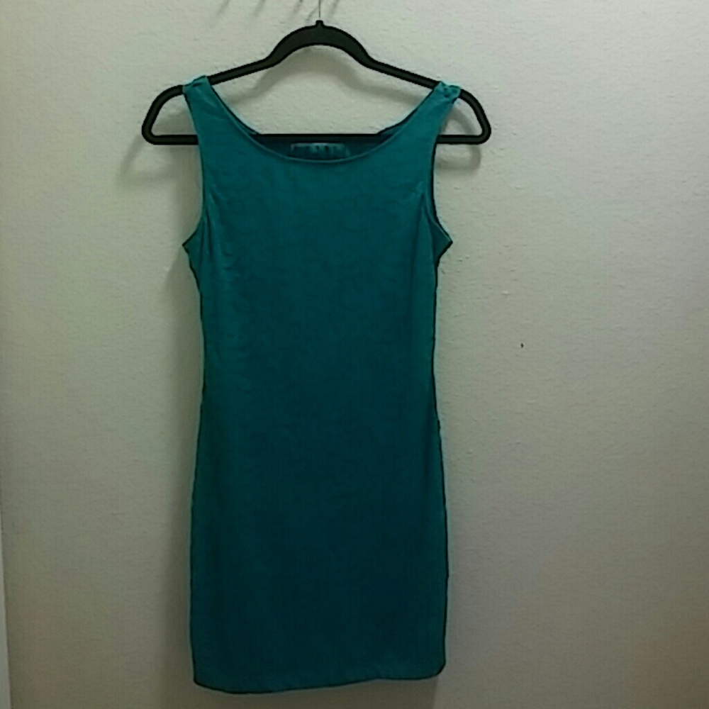 Turquoise mini/midi dress.lace and lining quality
